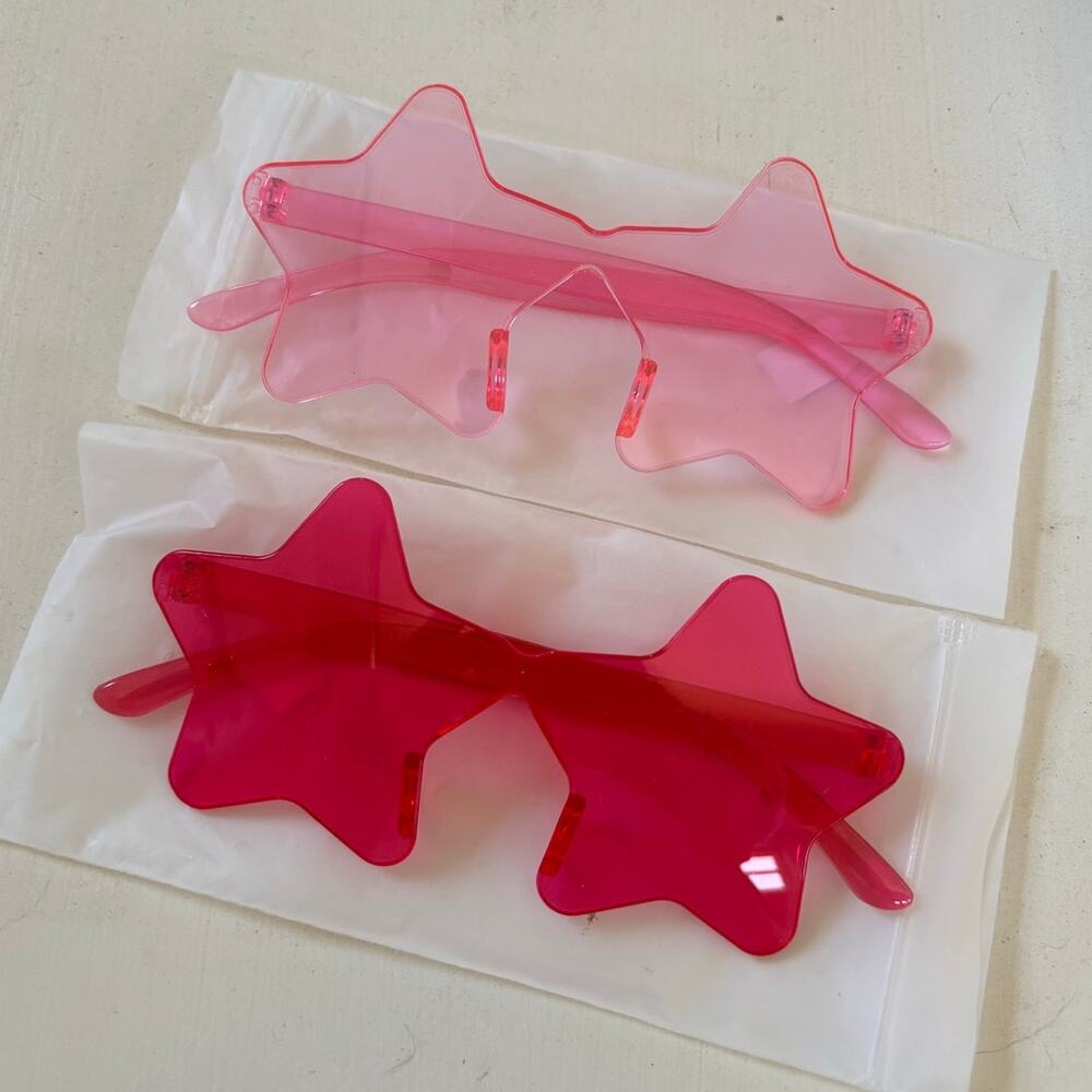 Two pink star-shaped sunglasses